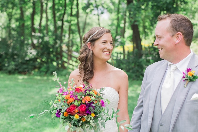 Colourful Codes Mill Wedding - Bride and Groom first look photos in Stewart Park