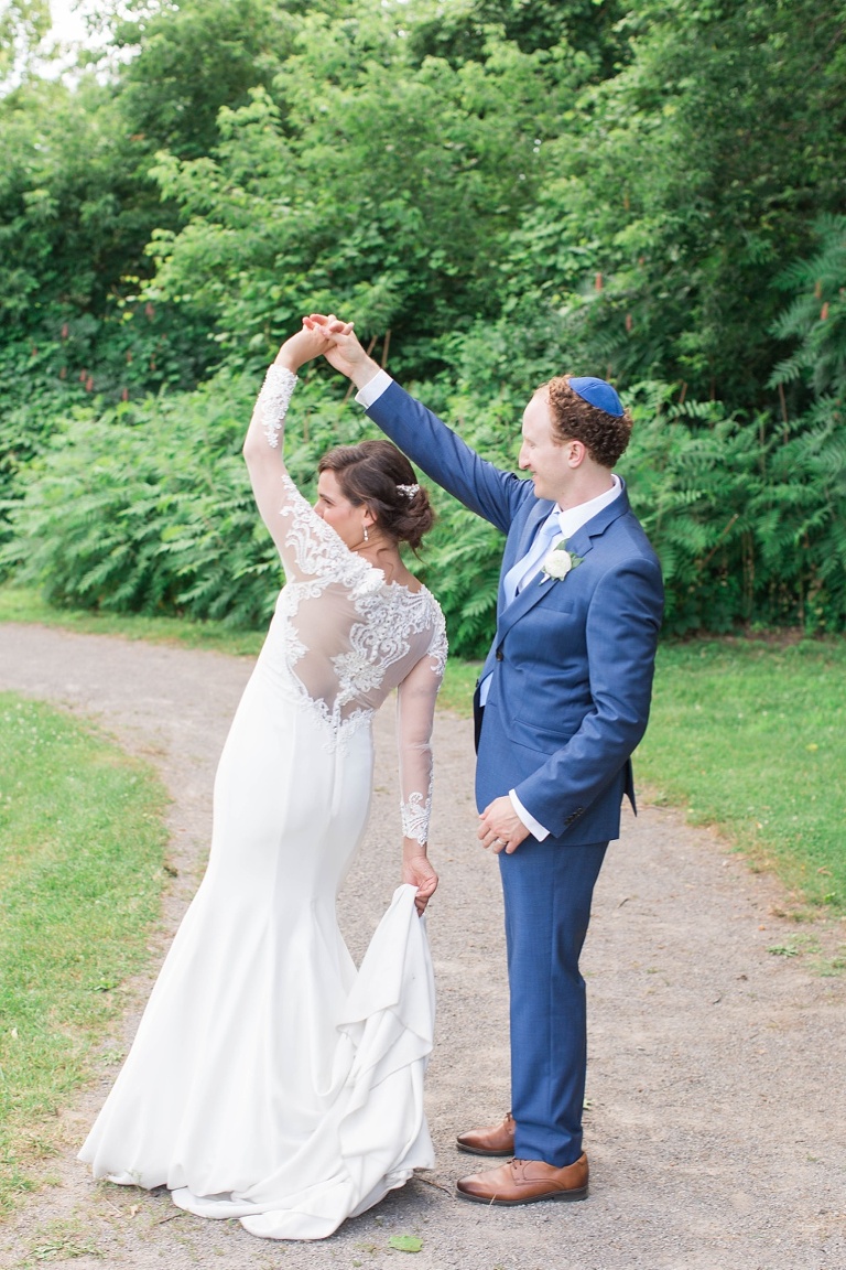 Billings Estate Ottawa Wedding - Bride and Groom having First Look photos at Ottawa Arboretum