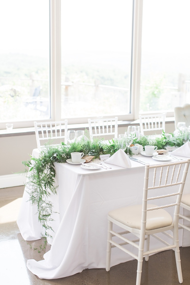 Le Belvedere Summer Wedding reception with white and green florals and decor